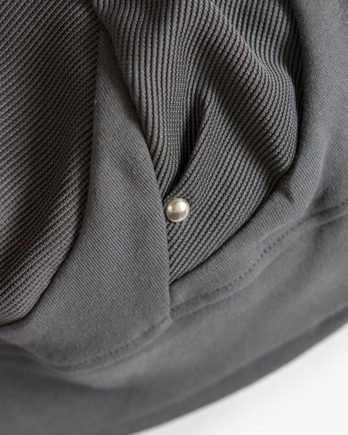 PLEATED RIVET BEANIE